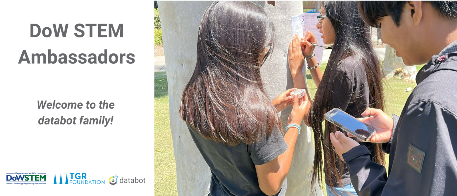 DoW STEM welcome page with an image of students collecting environmental data